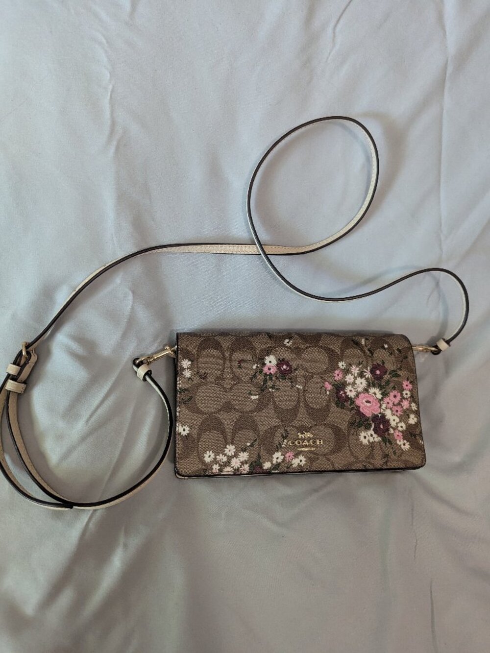 Small brown flowered COACH purse